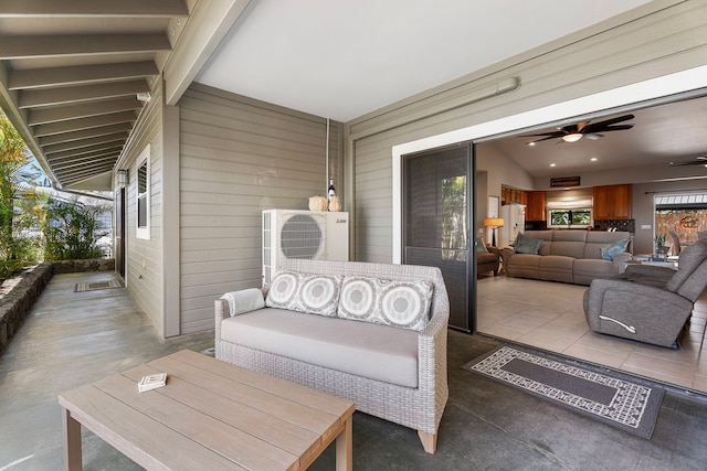 view of patio featuring ac unit, an outdoor hangout area, and ceiling fan