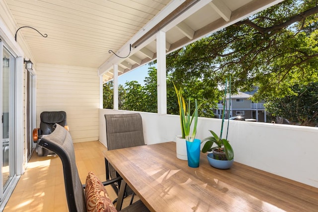 view of patio featuring a balcony