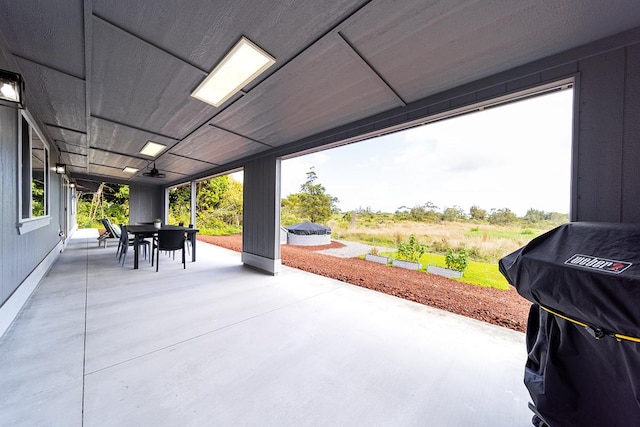 view of patio / terrace featuring outdoor dining area and grilling area