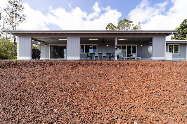 back of house with a patio area