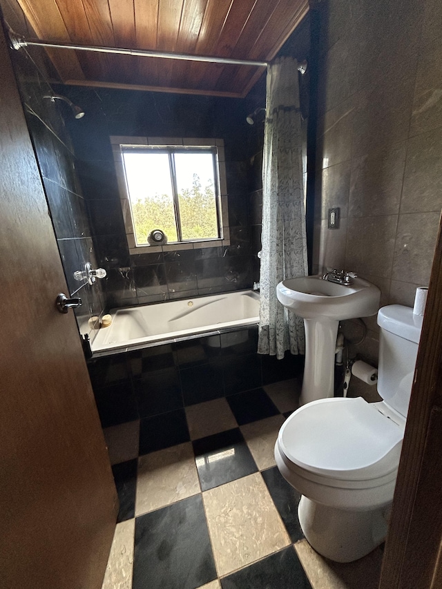 bathroom with tile walls, wood ceiling, toilet, and tiled shower / bath