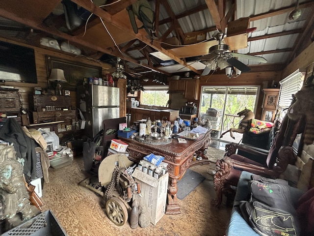 misc room with vaulted ceiling and ceiling fan