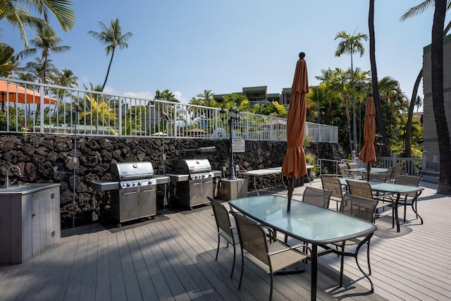 wooden deck featuring grilling area