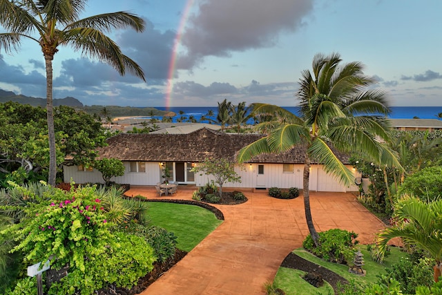 view of front of house with a patio area