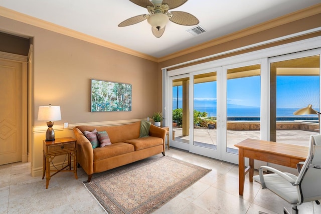 living area with a water view, ceiling fan, visible vents, and crown molding