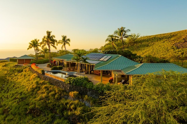 view of home's community with a patio