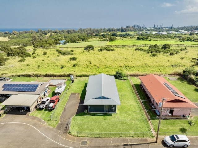 birds eye view of property with a rural view