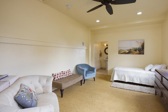 bedroom featuring ceiling fan and ensuite bathroom