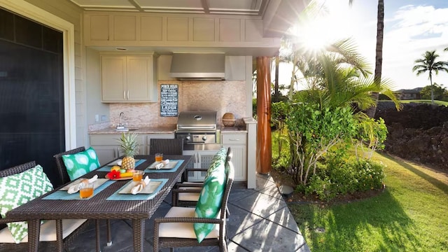 view of patio featuring sink, grilling area, and an outdoor kitchen