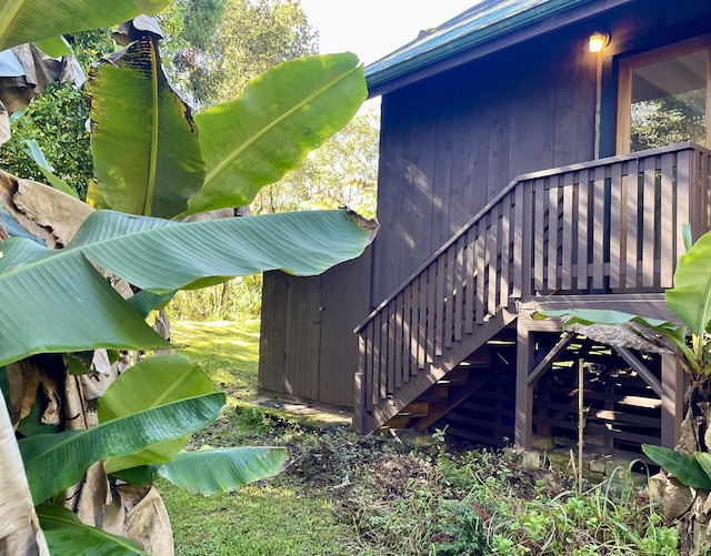 view of home's exterior with stairs