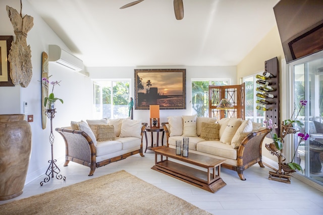 living room with ceiling fan, lofted ceiling, a wall mounted AC, and plenty of natural light