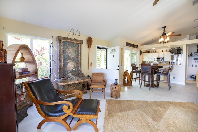 interior space with ceiling fan