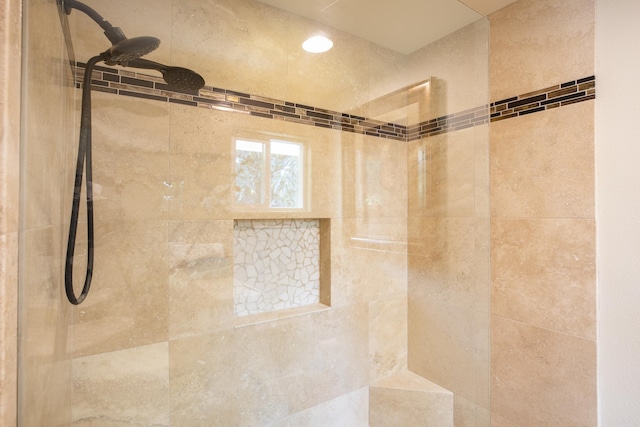 room details featuring tiled shower