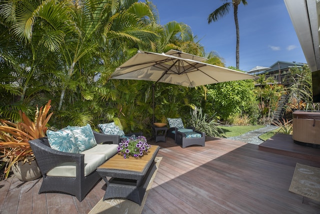 wooden deck with an outdoor living space