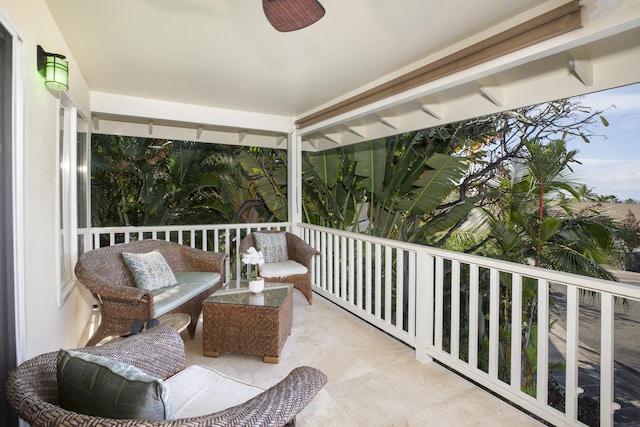 balcony featuring ceiling fan