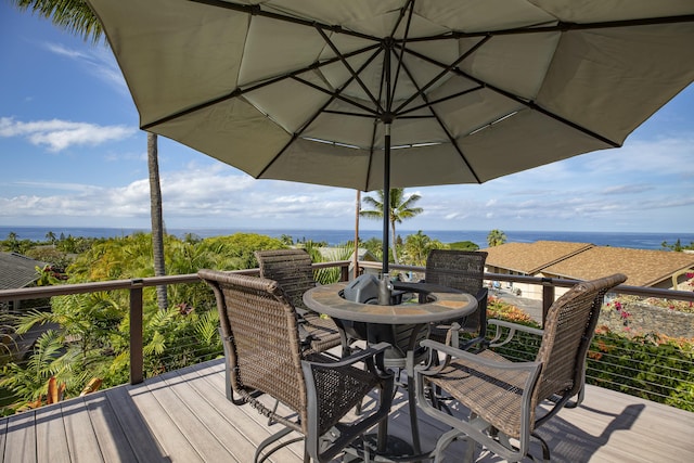 wooden terrace with a water view