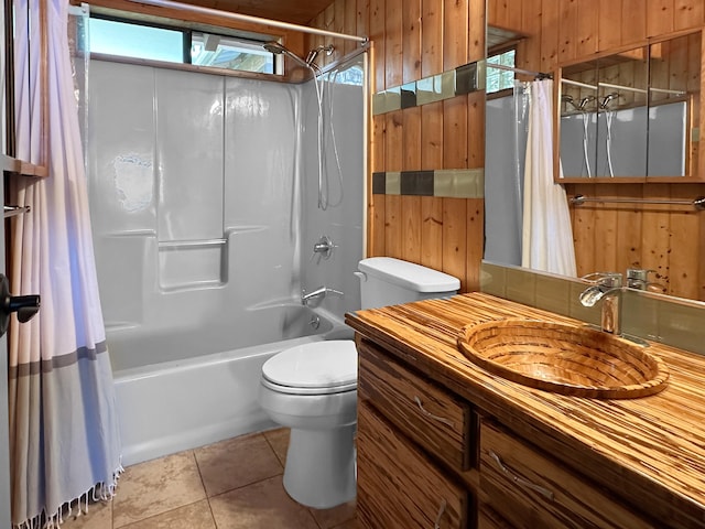 full bathroom featuring shower / bath combination with curtain, wooden walls, toilet, and tile patterned flooring