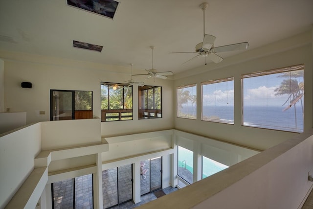 interior space featuring a ceiling fan