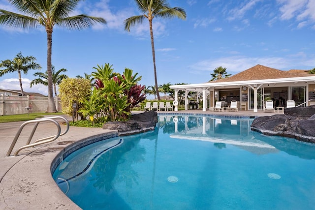 view of swimming pool with a patio