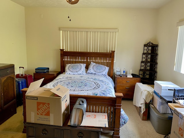 bedroom with light carpet