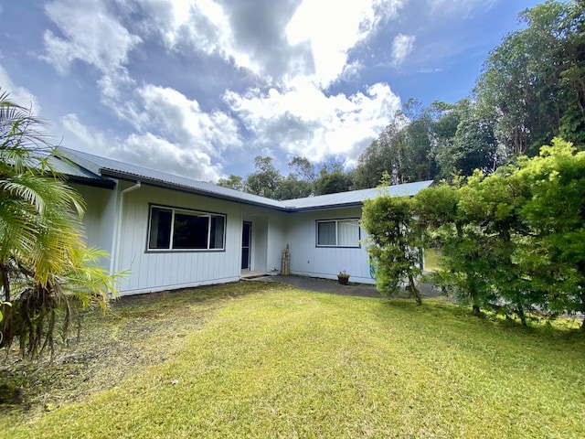 exterior space with a front yard