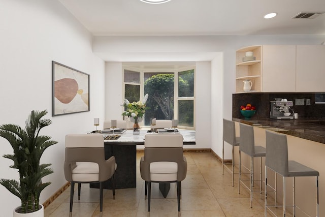 view of tiled dining area