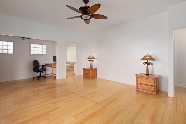 office area with ceiling fan and light hardwood / wood-style floors