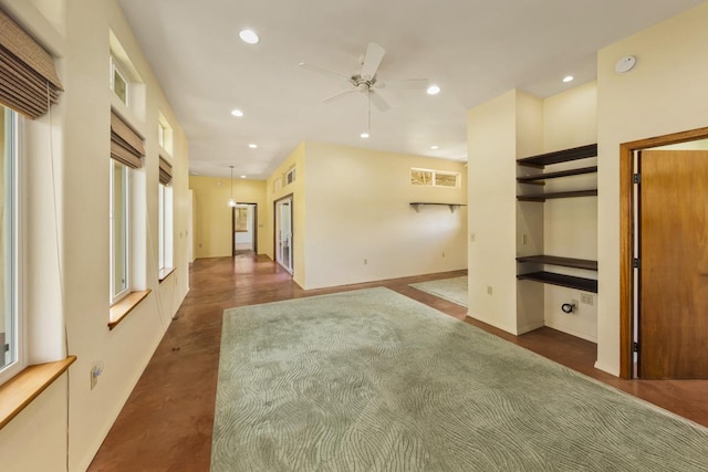 unfurnished living room featuring recessed lighting, baseboards, and a ceiling fan