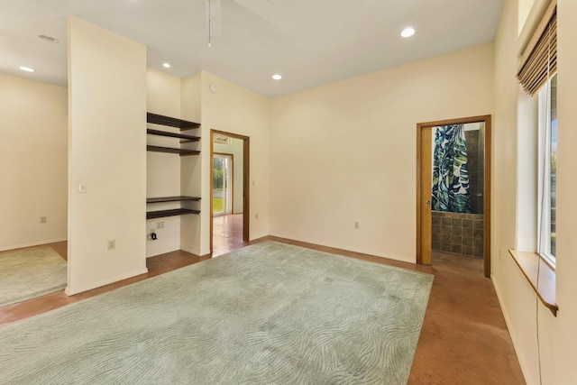 unfurnished bedroom featuring carpet flooring, recessed lighting, and baseboards