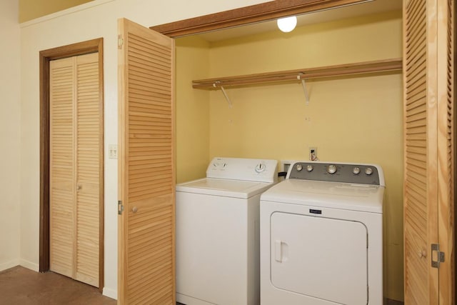 clothes washing area with laundry area and separate washer and dryer