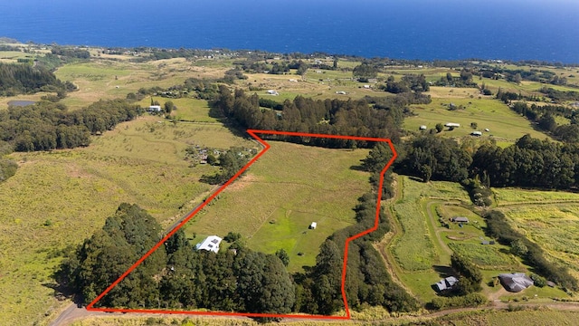 birds eye view of property featuring a rural view