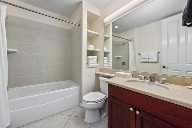 full bathroom with shower / bath combo, vanity, toilet, and tile patterned floors