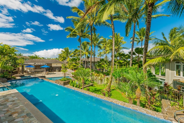 view of swimming pool featuring a patio area