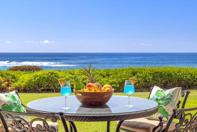 view of patio / terrace featuring a water view