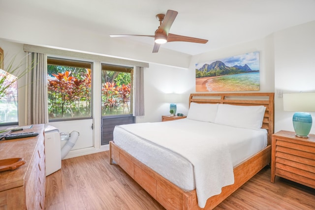 bedroom featuring light wood finished floors and a ceiling fan