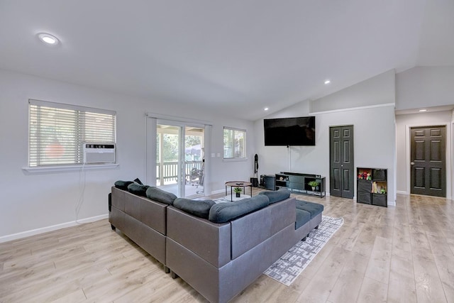 living room featuring light wood-type flooring, lofted ceiling, baseboards, and recessed lighting