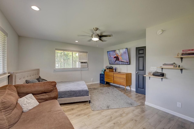 bedroom with light wood-type flooring, ceiling fan, baseboards, and recessed lighting