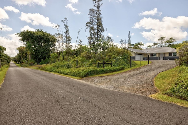 view of road featuring driveway