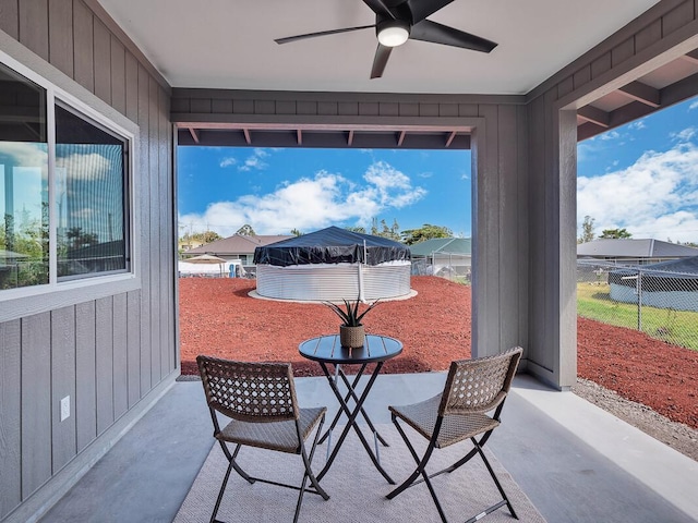 view of patio / terrace featuring ceiling fan