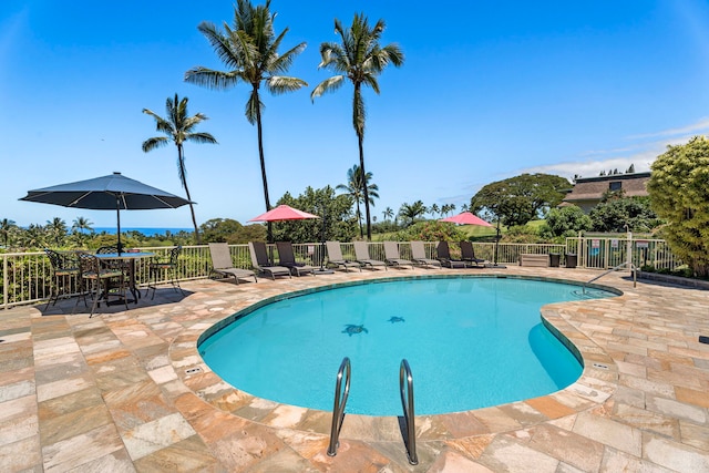 view of swimming pool featuring a patio area