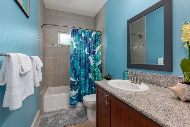 bathroom featuring shower / bath combination with curtain, vanity, toilet, and tile patterned floors