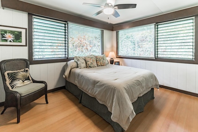 bedroom featuring light wood-style floors and ceiling fan