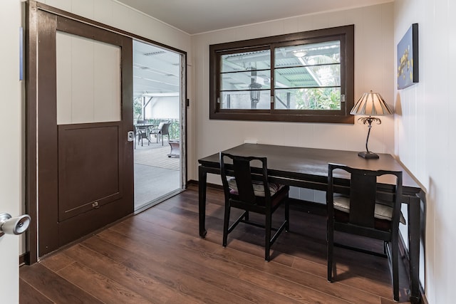 dining room with dark wood-style flooring