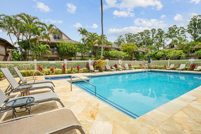 view of pool featuring a patio