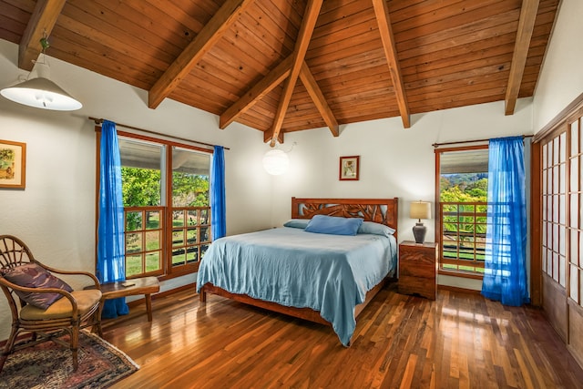 bedroom with vaulted ceiling with beams, dark wood-style floors, and multiple windows