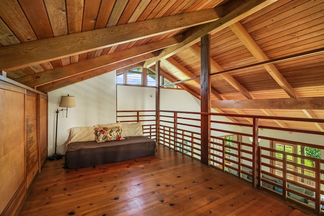 unfurnished room featuring lofted ceiling with beams, wooden ceiling, and dark wood-style flooring