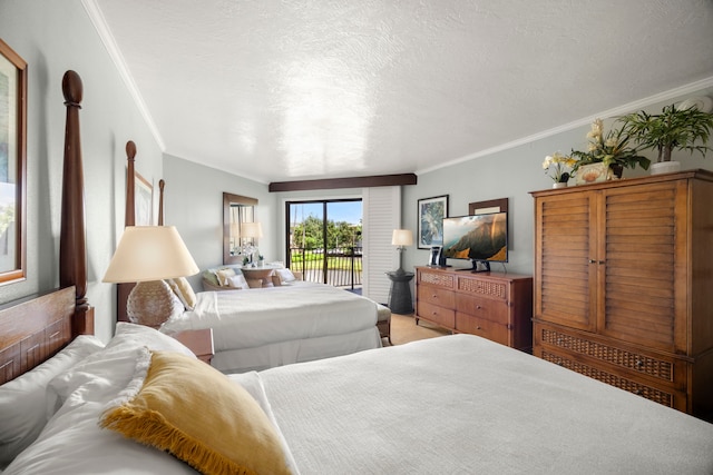 bedroom featuring access to outside, ornamental molding, and a textured ceiling