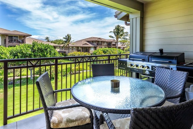 balcony featuring a grill