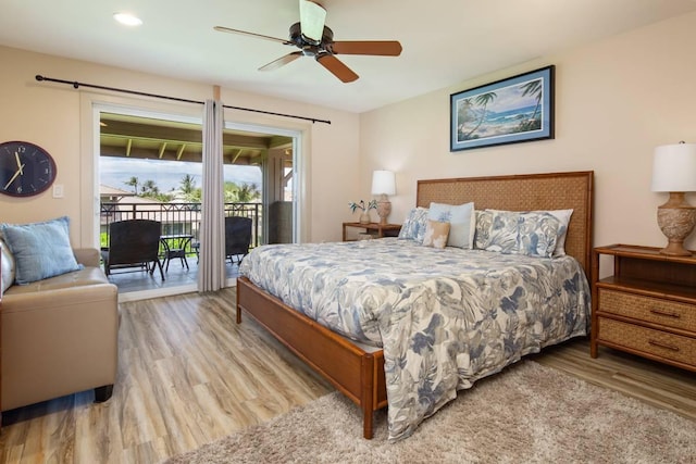 bedroom with light hardwood / wood-style flooring, access to outside, and ceiling fan