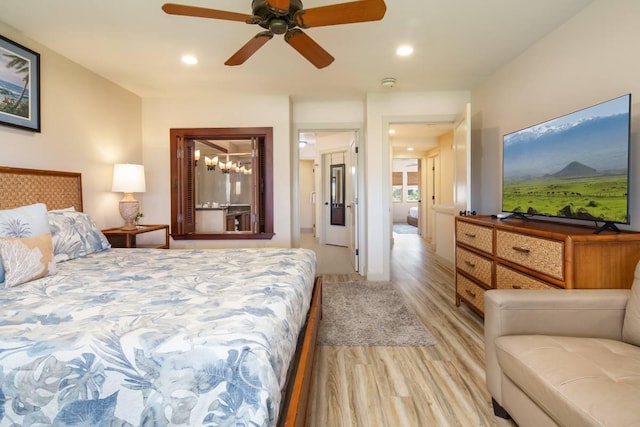 bedroom featuring ceiling fan and light hardwood / wood-style floors